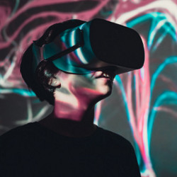 user wearing a VR headset in a VR room