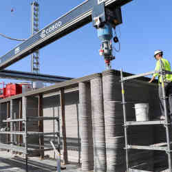 A 12-ton industrial 3-D printer being used to print concrete.