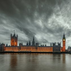 Dramatic HDR photo of England's Palace of Westminster on the River Thames.