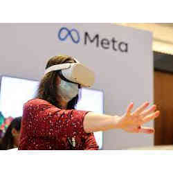 A woman experiencing virtual reality.