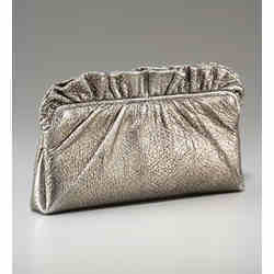 A Laura Merkin Georgie ruffled metalic clutch.