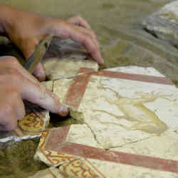 Putting the frescoes back together.