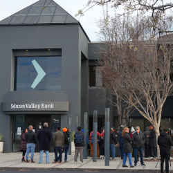 Clients and journalists outside Silicon Valley Bank on Monday.