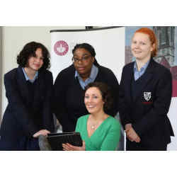 Cornelia Connolly, seated, with students of Dominican College, Taylors Hill, Galway, Ireland.