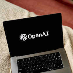 The OpenAI logo on a laptop display.