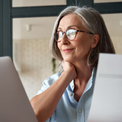 older worker at a computer