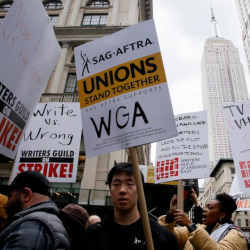 Writers Guild of America members walking the picket line. 