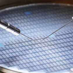 Working on chips on a silicon wafer.