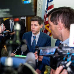 OpenAI CEO Sam Altman answers questions from the press. 