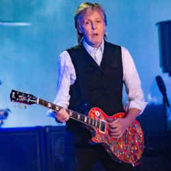 Paul McCartney performing.