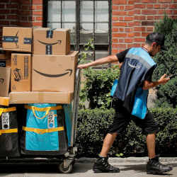 An Amazon worker making deliveries.