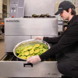 Employees still must hand-mash the prepared avocados to make guacamole.