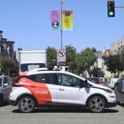 A Cruise self-driving car stops itself in the middle of a San Francisco intersection.