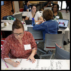 teachers prepare presentations for the Arkansas STRIVE program 