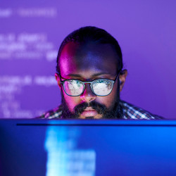 programmer at a monitor