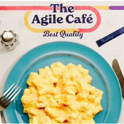 plate of scrambled eggs on table marked 'The Agile Caf'