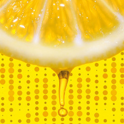 juice drips from a slice of lemon