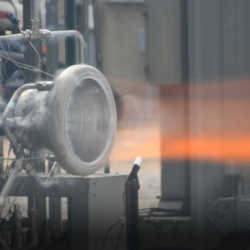 The RAMFIRE nozzle performing a hot fire test.