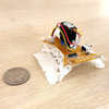 Centimeter-Scale Quadruped Leverages Curved-Crease Origami