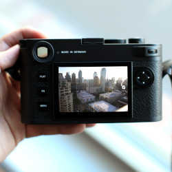 The digital camera is displaying an image taken in a city.