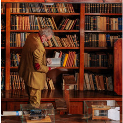 professor in a campus library