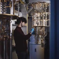 A researcher working on a quantum computer.