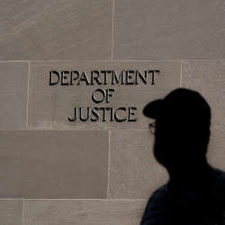 A sign at the entrance to the Department of Justice.