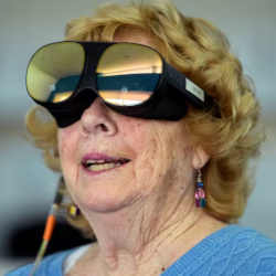 Karen Audet, an 82-year-old retired elementary school teacher, wears a Mynd Immersive virtual reality headset.